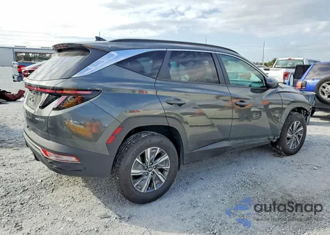 2022 Hyundai Tucson Blue from USA, damaged, VIN KM8JBCA18NU018541